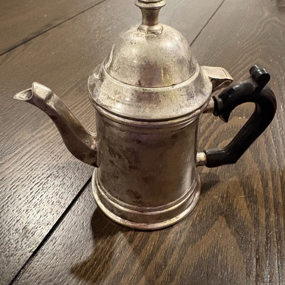 Silver Teapot with Black Handle